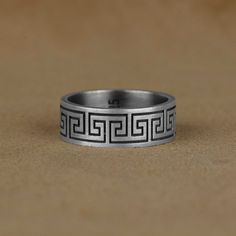 Ancient Greek Meander Promise Men Ring, Grecian Men Silver Wedding Band Ring, Sterling Silver Mythology Ring, Gift For Husband Made of 925 silver and handcrafted by hand, this ring is not only an accessory piece that complements your daily elegance, but also has details that will reflect your character and style. It is also a great gift to give to your loved ones on their special days. At SavisSilver, we always give importance to the satisfaction of our customers, we recommend you to read the fo Greek Rings For Men, Greek Meander, Greek Men, Greek Ring, Silver Wedding Band, Silver Wedding Bands, Men Ring, Men Jewelry, Gift For Husband