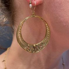 This perfect pair of intricately textured, bold yet timeless hoops are a wonderful addition to any outfit. Vintage, handmade in 14k vermeil and base metal Earrings measure approx. 43mm x 12mm Because we do all our restoration work by hand, we can offer a huge array of customization. If you have inquiries about sizing, alterations, or engraving, you can inquire about a quote here. As with all antiques, this piece is one-of-a-kind and can sell at any time. All vintage and antique sales are final. Exceptions might be made based on special circumstances. Intricate Brass Hoop Earrings, Elegant Crescent Brass Hoop Earrings, Elegant Crescent Shaped Brass Hoop Earrings, Elegant Hammered Crescent Earrings, Yellow Gold Brass Hoop Earrings With Intricate Design, Delicate Yellow Gold Hoop Jewelry, Brass Filigree Hoop Earrings, Artisan Gold Earrings With Intricate Design, Pierced Round Recycled Gold Jewelry