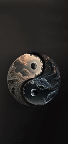 two black and white yin - yangs are floating in the water with clouds above them