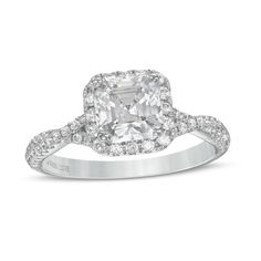 Start your happily ever after with this elegant diamond engagement ring from the Vera Wang Love Collection. Created in 14K white gold, this entrancing look showcases a 1 ct. certified Asscher-cut diamond - boasting a color rank of I and clarity of SI2 - wrapped in a cushion-shaped frame of diamonds. Shimmering diamond-lined twist ribbons grace the shank while set into the gallery are two princess-cut blue sapphires, the signature of the collection and a symbol of faithfulness and everlasting lov Wedding Fine Jewelry Halo Ring In Diamond White, Fine Jewelry Diamond White Halo Wedding Ring, Diamond White Halo Wedding Ring, Wedding Rings With Emerald Cut Diamond Accents, Emerald Cut Rings With Diamond Accents For Wedding, Lab Grown Diamond Asscher Cut Wedding Rings, Wedding Asscher Cut Lab Grown Diamond Ring, Asscher Cut Lab Grown Diamond Wedding Ring, Diamond Halo Setting Ring For Wedding