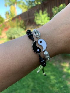 Ying and Yang Friendship Bracelets ☯️ The yin yang is an ancient symbol of harmony and balance. Both bracelets are included in your purchase. They can be worn together or given to a friend or lover. ✨ Symbolic Friendship Bracelets, Adjustable Symbolic Friendship Bracelets, Black Round Casual Friendship Bracelets, White Symbolic Friendship Bracelets, Symbolic White Bracelets For Friendship, Casual Black Round Friendship Bracelets, Ying Yang Bracelet, Yin Yang Jewelry, Ideas Cartas