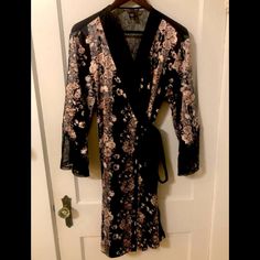 -This Is A Gorgeous Satin And Lace Robe From Victoria's Secret. -She Has Thick, Super Soft Material, Gorgeous Print And Beautiful Lace Details. -New Without Tags, Near Perfect Condition With No Visible Flaws, Just Want Something Longer -She's Sexy, Elegant And Soft! -M/L And Fits Anywhere From A Loose M To A Perfect L Or Even Xl. -Hit Slightly Lower Than Mid Thigh (I'm 5'7) Sleepwear Robe, Black Cream, Soft Material, Lace Detail, Women's Intimates, Victoria's Secret, Satin, Cream, Tags