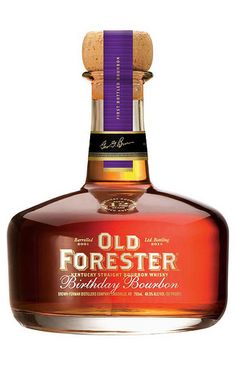 a bottle of old forester bourbon on a white background