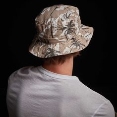 Our Camo Palm Print Bucket Hat is made from 100% cotton and features a built in sweatband. Offered in two sizes. Fit runs small, sizing up is recommend. Additional Information:• 100% Cotton Palm Print, Bucket Hat, Camo, Built In, Angeles, Hats, Los Angeles