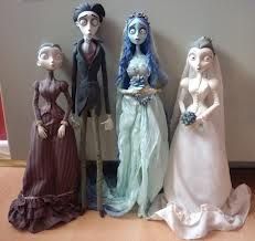 a group of figurines that are standing next to each other