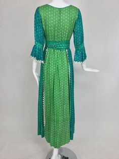 For Sale on 1stDibs - Vintage aqua and green silk print maxi dress with white trim 1970s...Labeled the Mirrors...Scoop neck fitted bodice with 3/4 length sleeves that have a Mirrors Vintage, Aqua And Green, Green Silk, White Maxi Dresses, White Trim, Printed Maxi, Fitted Bodice, Printed Maxi Dress, Silk Printing