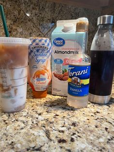 the ingredients for an iced drink are on the counter