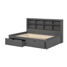 a bed with two drawers underneath it