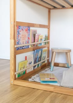 there is a bookshelf in the room with children's books