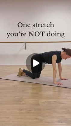 a woman is doing a yoga pose in front of a sign that says, one stretch you're not doing