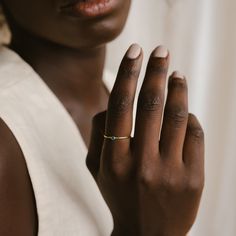 Look at our cutest Tiny Birthstone Ring! The itty bitty gemstone detailing is so subtle, it's almost bold, and will add a gentle birthstone-colored hue to your look for a soft and sweet touch of charm. Material: High-Quality Solid 925 Sterling Silver Finish: Sterling Silver ∙ 18K Gold ∙ Rose Gold Stone Dimensions: 2mm Genuine CZ Gemstone SKU: MM-RM45 Sizing Guide Rings are created true to standard US sizing. For the best fit we suggest having your finger(s) sized. We offer a physical ring sizer Everyday Tiny 14k Gold Birthstone Ring, Everyday Delicate 14k Gold Birthstone Ring, Dainty 14k Gold Topaz Birthstone Ring, Minimalist Gold Topaz Birthstone Ring, Minimalist Yellow Gold Topaz Birthstone Ring, Yellow Gold Topaz Birthstone Ring In Minimalist Style, May Birthstone Ring With Single Diamond For Promise, May Birthstone Promise Ring With Single Diamond, Minimalist Topaz Birthstone Ring As Gift