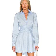 New Never Worn Bardot Dress Light Blue Long Sleeve Ruched Dress, Chic Light Blue Ruched Mini Dress, Chic Light Blue Long Sleeve Shirt Dress, Chic Blue Shirt Dress For Party, Chic Light Blue Long Sleeve Mini Dress, Chic Blue Shirt Dress For Dress Down, Chic Blue Shirt Dress For Dress Down Occasions, Chic Blue Shirt Dress For Casual Wear, Casual Blue Chic Shirt Dress