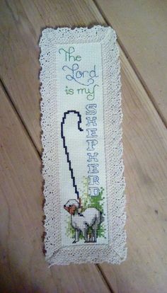 a cross - stitch bookmark with the words'the lord is my shepherd '