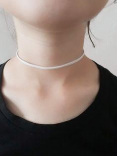 Whitte choker, Suede choker in white, Simple choker, Plain choker,Thin choker This choker / necklace is a great finish to any outfit.This choker fastens with a lobster nail ending with a 2 inch extension. The width of the choker is 3 mm. You can choose from sizes 11 to 16 inches, the model size of the photo is 12 inches. It can be transformed into a two-row bracelet. The choker ends with a gold or silver color clasp. Shipping: Each product is carefully packaged in a gift bag and packaged in an air bubble bag. Delivery time: we try to fulfill your orders as soon as possible.If the product is delayed for more than three weeks Please contact us. Every product in our store is made with a lot of love and positive energy.If you have further questions please do not hessitate to contact me. White Choker, Simple Choker, Teen Jewelry, Black Choker Necklace, Bubble Bag, Black Choker, Black Necklace, Choker Necklaces, Chain Styles