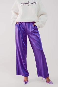 Full length. Pants. Plain design. Relaxed fit. Wide leg. Party. Glossy satin-style fabric . Side pockets . Zip fastening. Pleat detail. runs true to size. S. 100% Polyester Purple Satin Pants Outfit, Purple Wide-leg Pants For Party, Trendy Purple Wide-leg Bottoms, Casual Wide-leg Purple Pants, Purple Wide-leg Pants With Relaxed Fit, Purple Pants Outfit, Satin Pants Outfit, Luxury Purple Wide-leg Pants, Outfit Trabajo