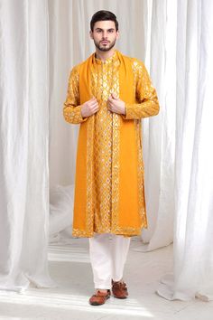 Yellow kurta with checkered patterns, embellished by sequins. Comes with pant and dupatta. - Aza Fashions Eid Cotton Silk Bandhgala With Dupatta, Eid Bandhgala With Dupatta In Cotton Silk, Festival Cotton Silk Bandhgala With Dupatta, Anarkali Sherwani With Zari Work In Cotton Silk, Anarkali Style Cotton Silk Festive Sherwani, Gold Sherwani With Mirror Work For Diwali, Navratri Cotton Silk Sherwani With Dupatta, Anarkali Cotton Silk Sherwani For Festivals, Festive Cotton Silk Sherwani With Dupatta