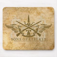 the sons of liberty logo on an old paper mouse pad with two crossed swords and wings