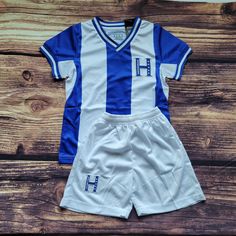 Kid's soccer uniform. Includes Jersey and Shorts.  Honduras kid's Uniform  Home Honduras set  Unbranded made of Polyester  New with tags Note . personalized items do not qualify for return or exchange,  if you need a personalization or have questions please contact seller previous to purchase. 3 days handling time for items with personalization Sporty Blue Sets For Sports Events, Sporty Short Sleeve Sets For Sports Events, White Moisture-wicking Sportswear Sets, White Moisture-wicking Sports Sets, White Sports Sets, White Sports Sets For Sports Season, White Sporty Sets For Sports Events, Casual White Sets For Sports Events, Outfit Jersey