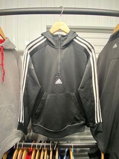 Vintage Adidas Essentials 3 Stripe Mens Black XS Hoodie | 90's - Vintage Style - Great Condition - Extra Small Size  📦Free Delivery (UK) & Same Day Dispatch      Approx 2-5 working days Transit  🌏Worldwide Dispatch (5-14Days) 📩message if any questions :) Black Half-zip Hoodie For Sports, Adidas Logo Hooded Hoodie, Sporty Streetwear Hoodie With Three Stripes Branding, Sporty Hoodie With Three Stripes For Streetwear, Sporty Streetwear Hoodie With Three Stripes, Hooded Track Jacket With Three Stripes For Streetwear, Sporty Track Jacket With Kangaroo Pocket For Streetwear, Three Stripes Hoodie Sweatshirt For Streetwear, Winter Sports Sweatshirt With Three Stripes