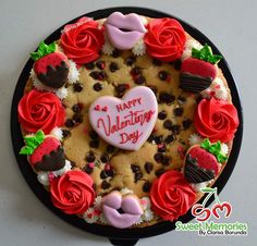 a valentine's day cake decorated with chocolate chips and roses