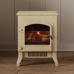 an old fashioned stove with a painting on it