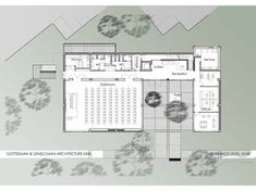 the floor plan for an office building with mountains in the background