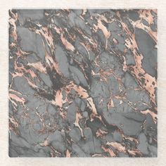 a black and pink marble textured wall hanging on a white frame with metal brackets