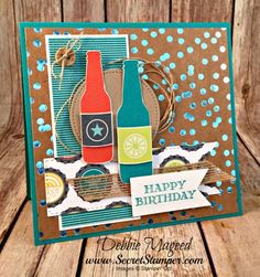 a handmade birthday card with two bottles