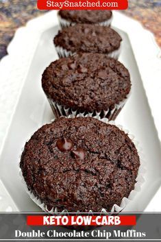 three chocolate muffins on a white plate with text overlay that says keto low carb double chocolate chip muffins