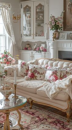 a living room filled with furniture and flowers