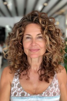 Embrace the beauty of natural curls with these 25 stunning curly hairstyles for women over 60. Each look celebrates the unique texture and volume of curly hair, offering styles that range from short and sassy Cute Short Curly Hairstyles, Medium Length Curls, Undercut Hairstyles Women, Curly Pixie Hairstyles, Fine Curly Hair, Square Face Hairstyles, Over 60 Hairstyles