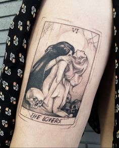 the lovers tarot card tattoo on the right thigh