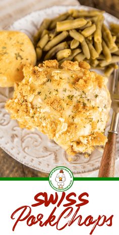 a white plate topped with green beans and chicken covered in gravy next to biscuits