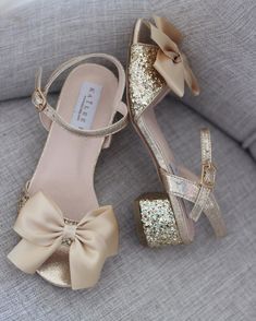 Party Sandals With Bow And Round Toe, Cute Ankle Strap Sandals For Party, Party Sandals With Satin Bow And Block Heel, Gold Sandals With Bow For Party, Gold Party Sandals With Bow, Gold Open Toe Sandals With Bow, Gold Heels With Bow And Round Toe, Gold Heels With Bow For Party, Gold Party Heels With Bow