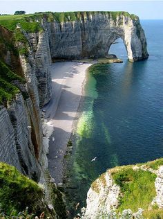 an aerial view of the beach and cliffs