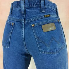 "Size 30 Wrangler Vintage Western Jeans W30 L33 High Waist Distressed Split Hem Jeans Mom Jeans Rodeo Riders Jeans Tall Jeans Made In Mexico . Brand: WRANGLER Size On Tag: W30 L34 but fits more like 30\" waist, 12\" rise, 24\" thighs, 39.5\" hips, 33\" inseam,16\" leg opening! Fits a size 30, but check your measurements and compares the measurement with your garment. (see full measurement below) Recommended waist size: 30\" (30x33) Material :  ✂ Cotton 100% ✂ Zipper ✂ Made In Mexico Distressed W Modern Western Fashion, Split Hem Jeans, Womens Distressed Jeans, Rodeo Rider, Jeans Tall, Jeans West, Wrangler Vintage, Western Jeans, Jean Vintage