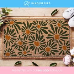 a door mat with flowers on it and the words, pre - created with our link formula