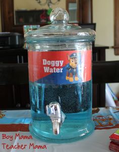 there is a jar that has a dogy water in it