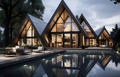 a house with three pyramid shaped windows next to a swimming pool at night, surrounded by trees and lawn furniture