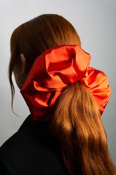 Girl with pony tail that has large red satin scrunhie in hair - the girl is wearing black suit and she is siting by white background Scrunchie Hair, Vegan Hair, Bold Accessories, Don't Settle, Hair Game, Red Satin, Scrunchie Hairstyles, Hair Ties