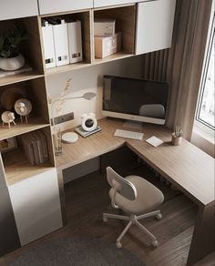 a computer desk with a monitor and keyboard on it