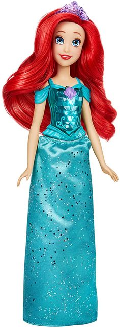 the little mermaid doll has long red hair and is wearing a blue dress with sequins