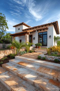 a house with steps leading to the front door