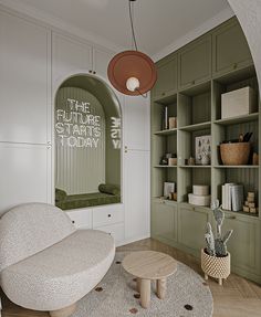 a living room filled with furniture and bookshelves next to a wall mounted bookcase