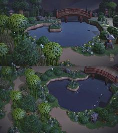 a small pond surrounded by lots of trees and plants with a bridge in the middle