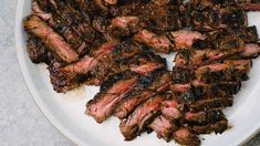 the steaks are on the plate ready to be grilled and put in the oven