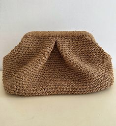 a brown purse sitting on top of a table