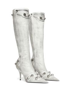 Cagole point-toe boots from BALENCIAGA featuring optical white, lambskin, pointed toe, stud embellishment, zip details, silver-tone hardware and stiletto heel.Heel 9 cm Balenciaga Outfit, White Heel Boots, Balenciaga Skirt, Cristobal Balenciaga, Balenciaga Boots, Knee Length Boots, Boots White, Latest Fashion Design, Stiletto Boots