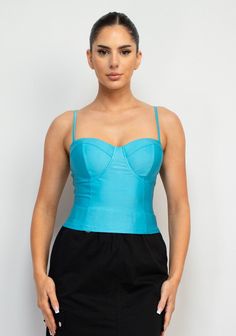 Sweetheart Corset-Like Cami Top Brand: Haute Monde Style: HMT56857 Fabric: 88% POLYESTER, 12% SPANDEX Details: A knit casual glamour top in solid color features a bustier corset-like bodice, sweetheart neckline, adjustable cami straps, and cropped length. Iris Tops Made in Cambodia. Summer Sweetheart Neckline Stretch Crop Top, Summer Stretch Crop Top With Sweetheart Neckline, Stretch Crop Top With Sweetheart Neckline For Summer, Chic Blue Camisole With Built-in Bra, Spring Tops With Medium Bust Support And Stretch, Spring Crop Top With Medium Bust Support, Solid Spring Top With Medium Bust Support, Solid Summer Crop Top With Medium Bust Support, Solid Color Summer Crop Top With Medium Bust Support