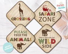 four coasters with animals on them and the words crossing, safari zone, please feed the animals, take a walk on the wild side